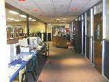 Van (TX) High School library's upper level, where librarian can supervise both of the split levels.